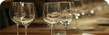 table-with-table-that-has-table-with-wine-glasses-lamp-it 1